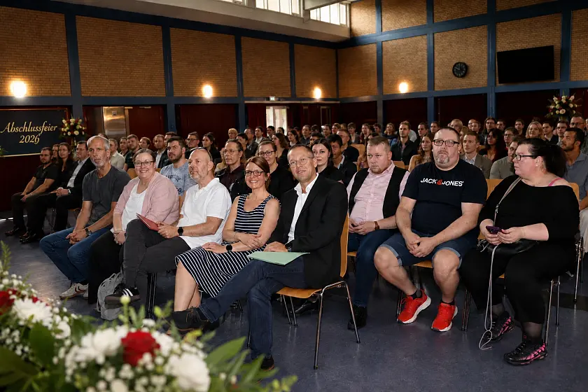Zuschauer:innen im Publikum