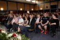 Zuschauer:innen im Publikum